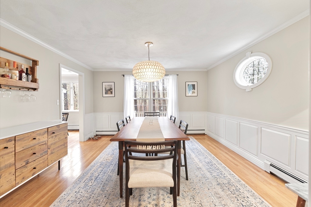 21 Batchelder Road Boxford, MA 01921 - Photo 16 of 37 a living room with furniture a table and a chandelier