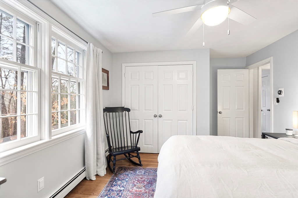 21 Batchelder Road Boxford, MA 01921 - Photo 25 of 37 a bedroom with a bed and a window