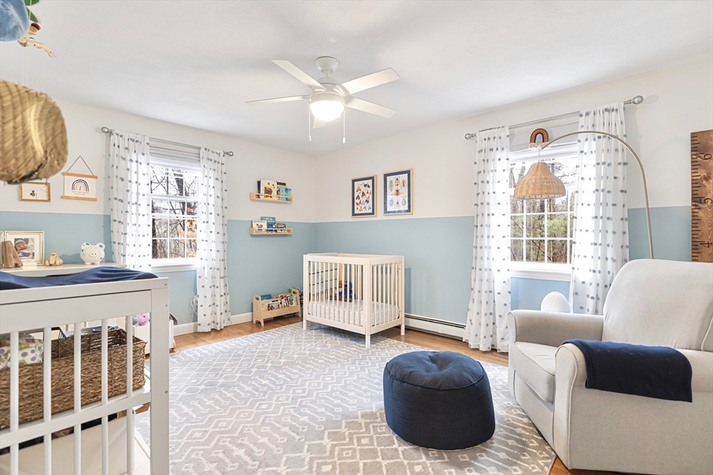 21 Batchelder Road Boxford, MA 01921 - Photo 26 of 37 a bedroom with furniture and a large window