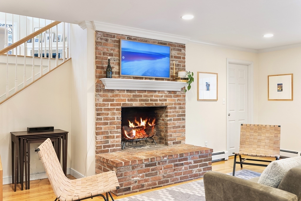 21 Batchelder Road Boxford, MA 01921 - Photo 10 of 37 a living room with furniture and a fireplace