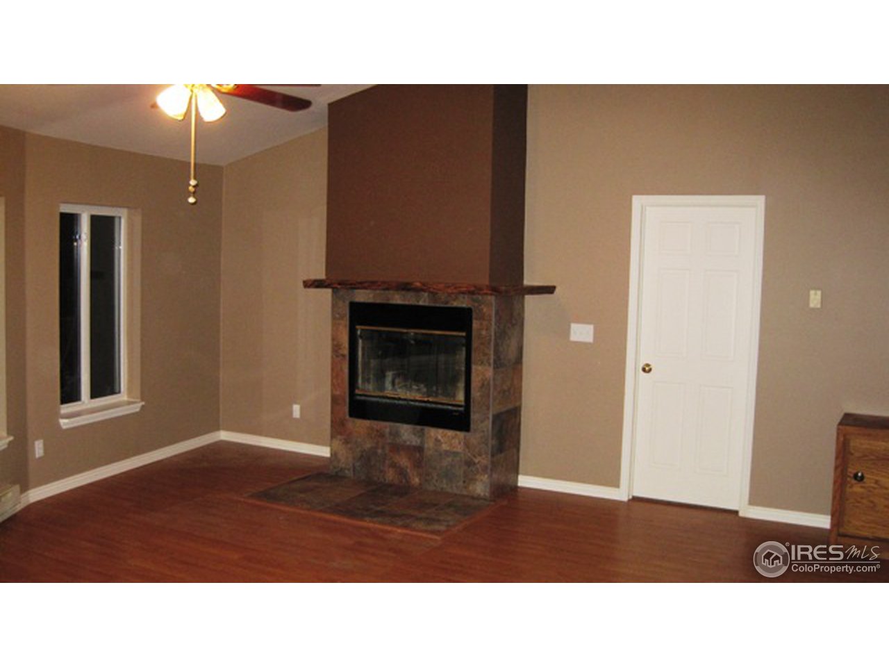 222 Beartrap Road Red Feather Lakes, CO 80545 - Photo 11 of 24 Great room - fireplace