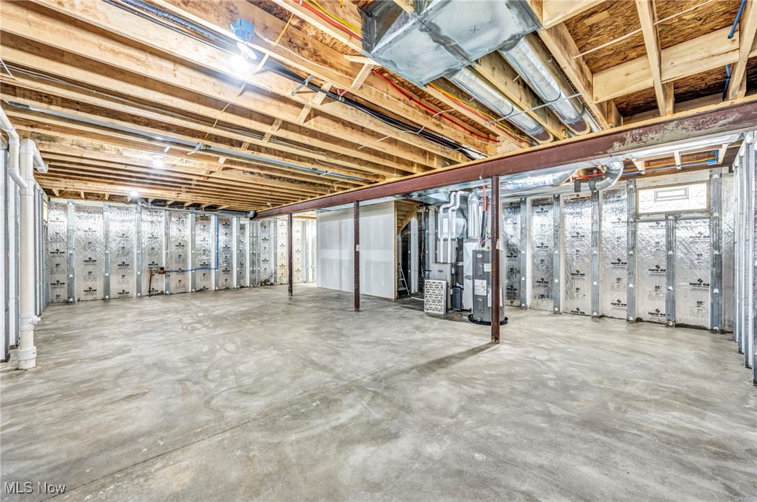 3709 Sudbury Road Cleveland, OH 44120 - Photo 28 of 29 Basement featuring electric water heater