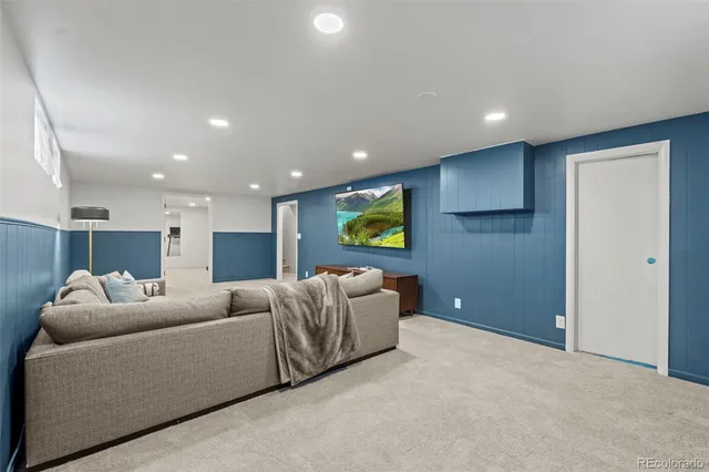 a living room with furniture and a couch