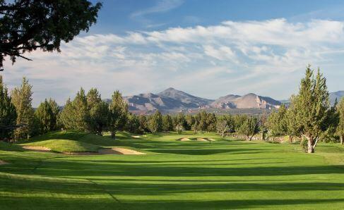 631 Sundance Ridge Court Redmond, OR 97756 - Photo 53 of 61 a view of a golf course with a big yard