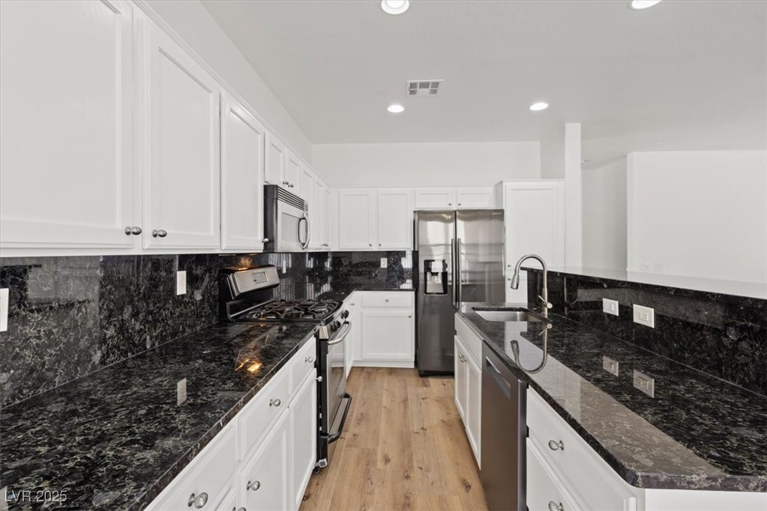 4966 Crimson Mare Road Las Vegas, NV 89139 - Photo 3 of 47 Chef's Kitchen with Large Island & Breakfast Bar