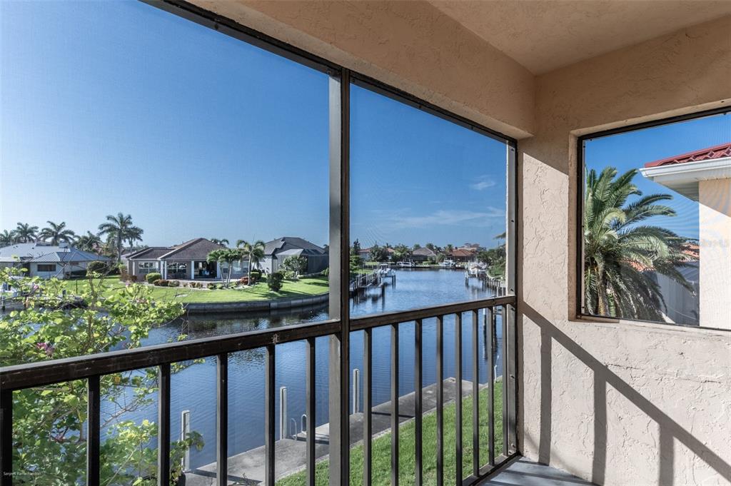 1204 Spanish Cay Lane, Unit B Punta Gorda, FL 33950 - Photo 11 of 45 a view of a street from a balcony