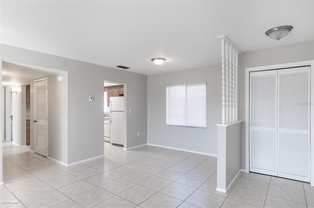 1204 Spanish Cay Lane, Unit B Punta Gorda, FL 33950 - Photo 15 of 45 a view of an empty room with window and bathroom