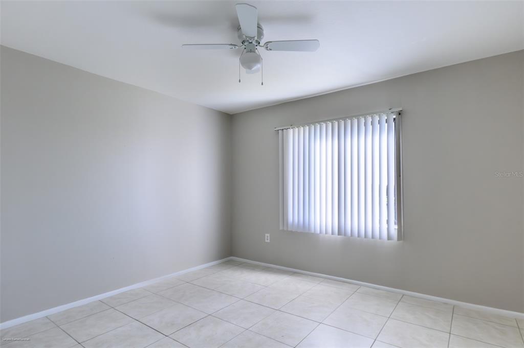 1204 Spanish Cay Lane, Unit B Punta Gorda, FL 33950 - Photo 23 of 45 a view of an empty room with a window