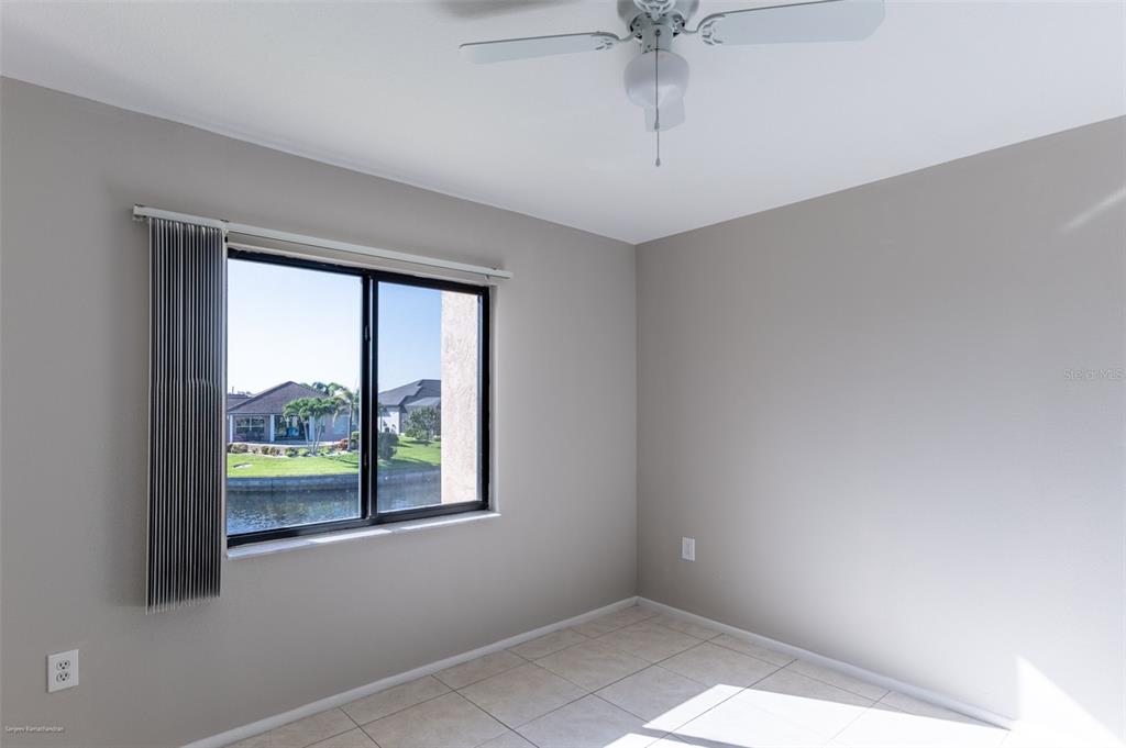 1204 Spanish Cay Lane, Unit B Punta Gorda, FL 33950 - Photo 24 of 45 an empty room with a window