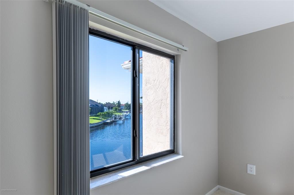 1204 Spanish Cay Lane, Unit B Punta Gorda, FL 33950 - Photo 25 of 45 a view of a room that has a large window