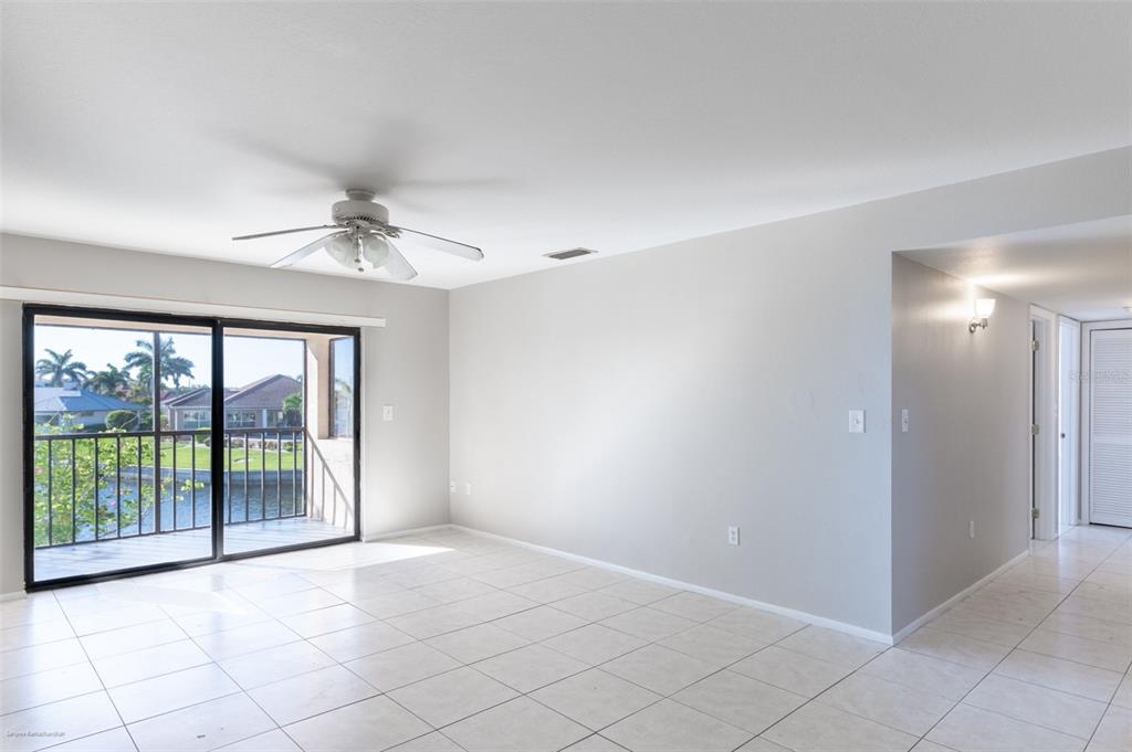 1204 Spanish Cay Lane, Unit B Punta Gorda, FL 33950 - Photo 7 of 45 a view of an empty room with a window