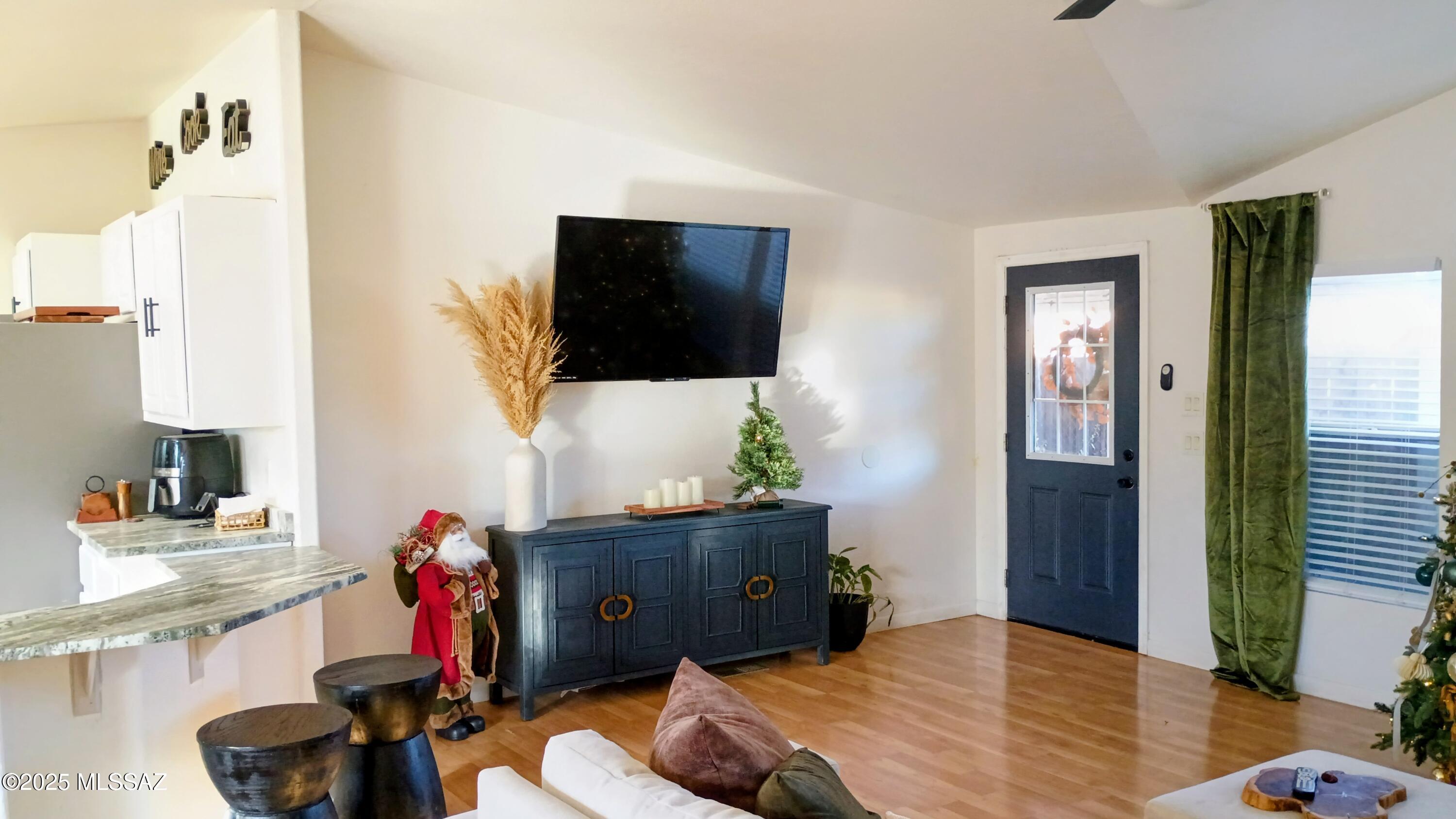 1449 West Hualpai Road Tucson, AZ 85745 - Photo 8 of 49 a bedroom with a bed and flat screen tv