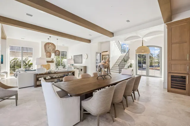 a living room with furniture fireplace and a flat screen tv