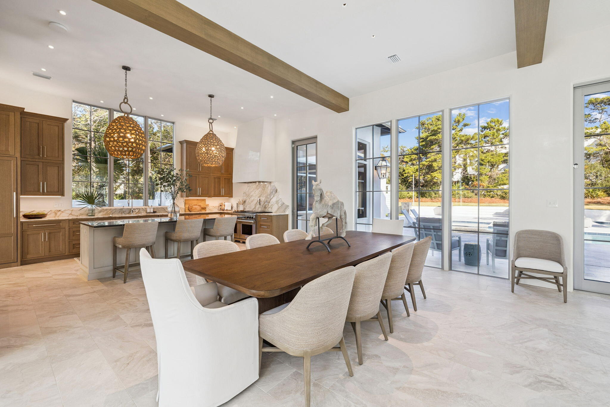 306 Walton Rose Lane Inlet Beach, FL 32461 - Photo 24 of 117 a dining hall with stainless steel appliances kitchen island granite countertop a table chairs and a view of living room