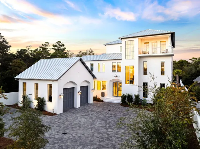 a kitchen with stainless steel appliances granite countertop a stove and cabinets