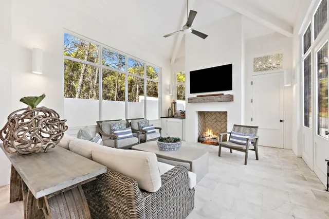 a view of house with yard outdoor seating and plants