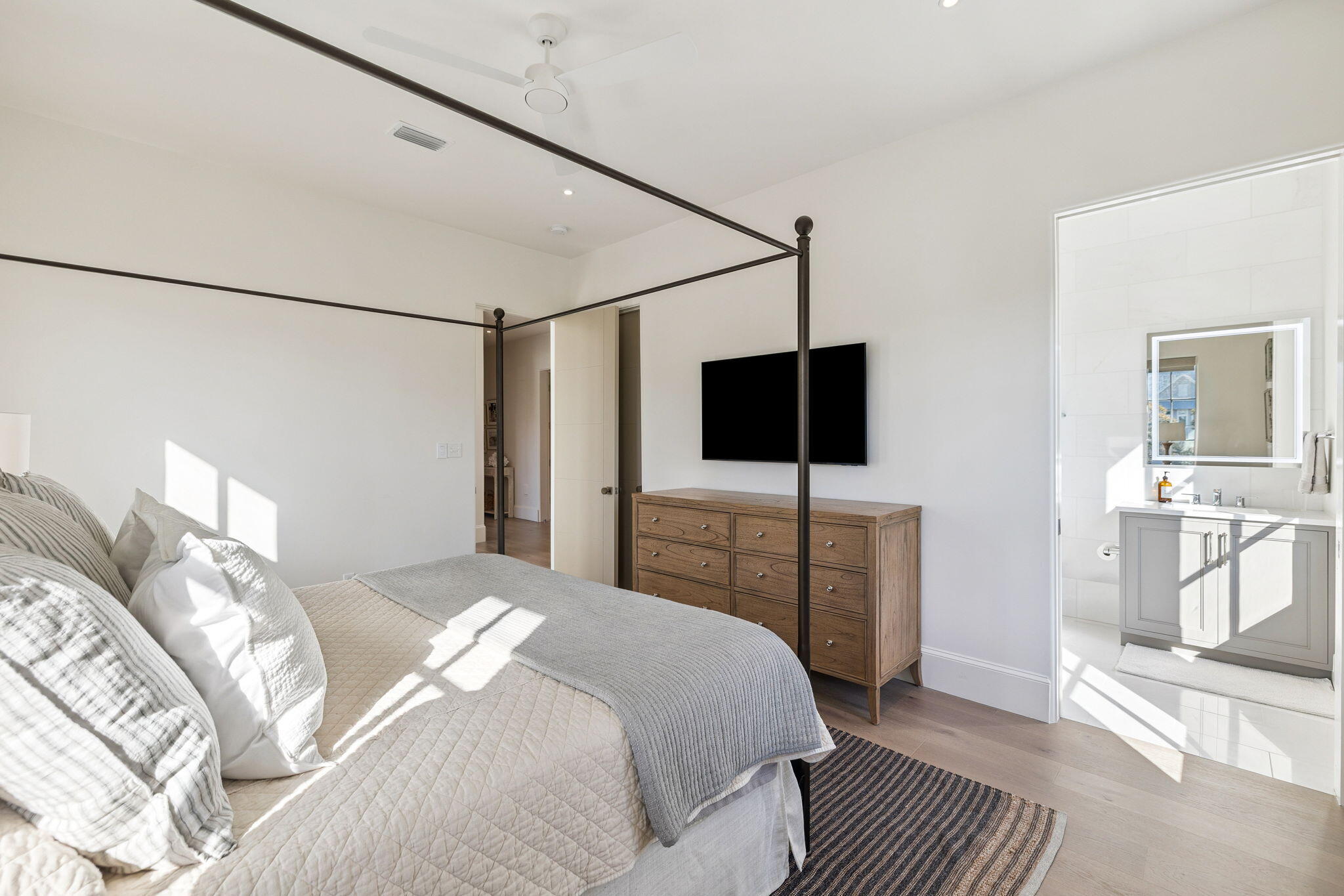 306 Walton Rose Lane Inlet Beach, FL 32461 - Photo 59 of 117 a bedroom with a bed and a flat screen tv