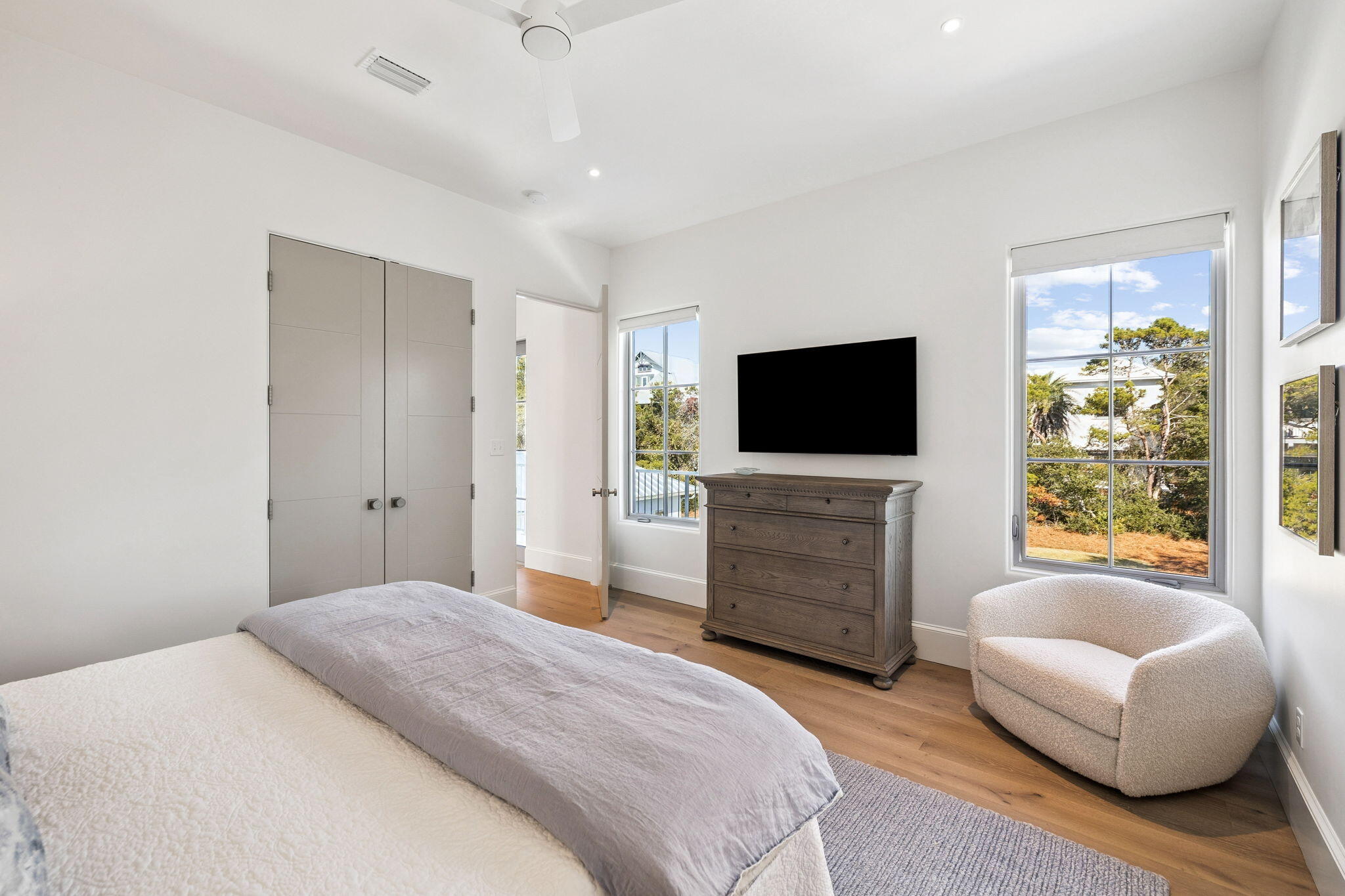 306 Walton Rose Lane Inlet Beach, FL 32461 - Photo 70 of 117 a bedroom with a bed and a flat screen tv