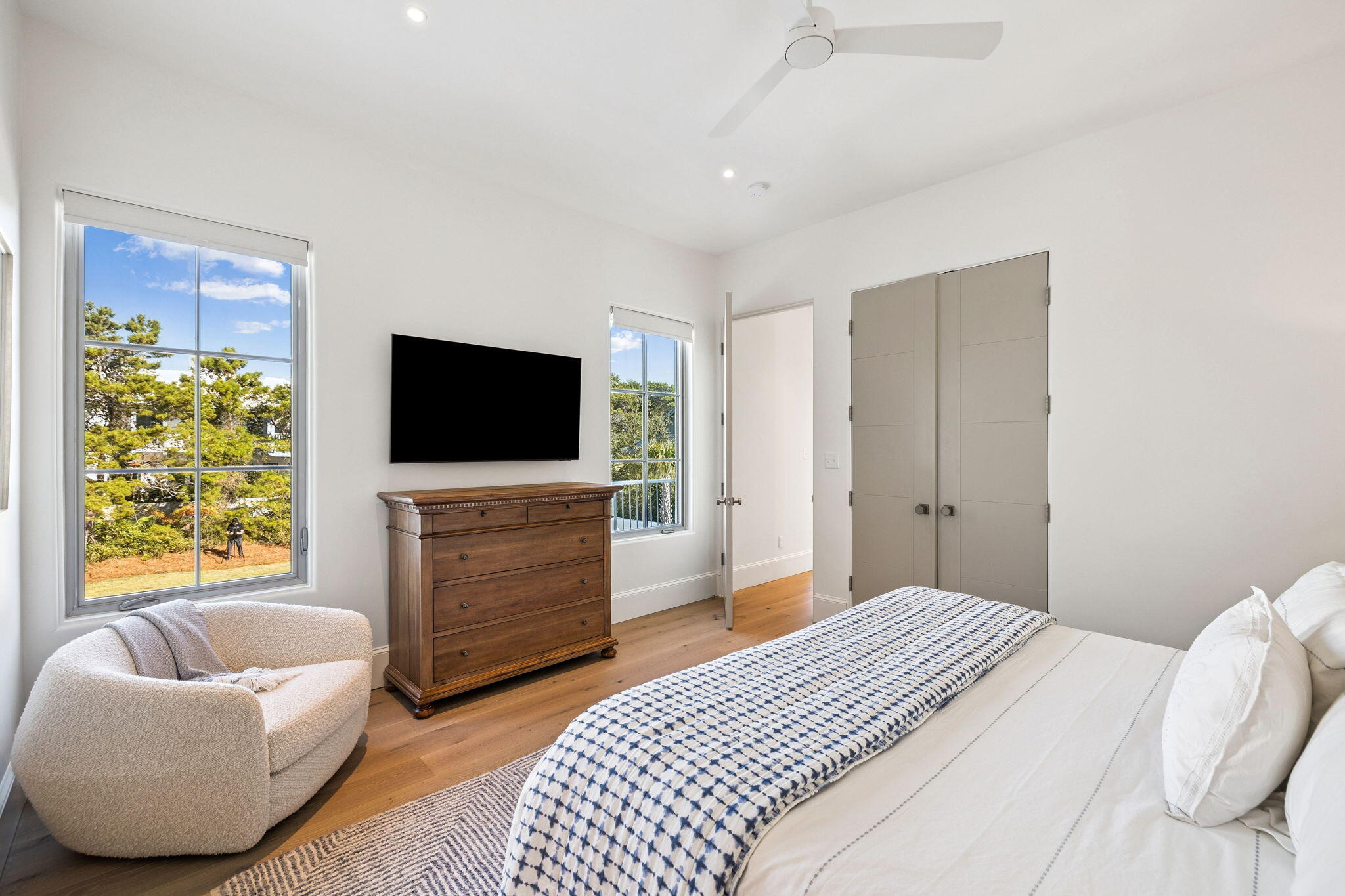 306 Walton Rose Lane Inlet Beach, FL 32461 - Photo 74 of 117 a bedroom with a bed and a flat screen tv