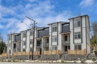 a front view of a house with street