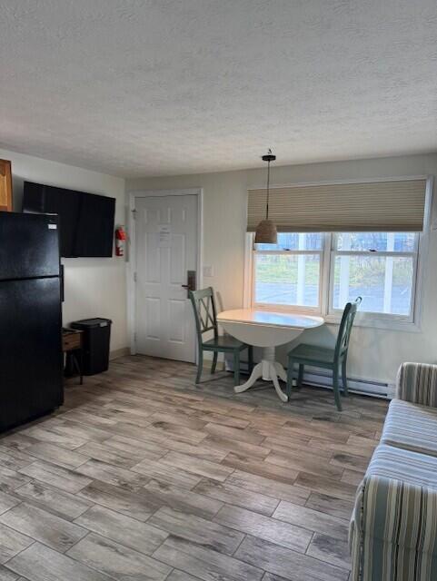1072 Post Road, Unit 111 Wells, ME 04090 - Photo 9 of 10 N M 111 KITCHEN TABLE