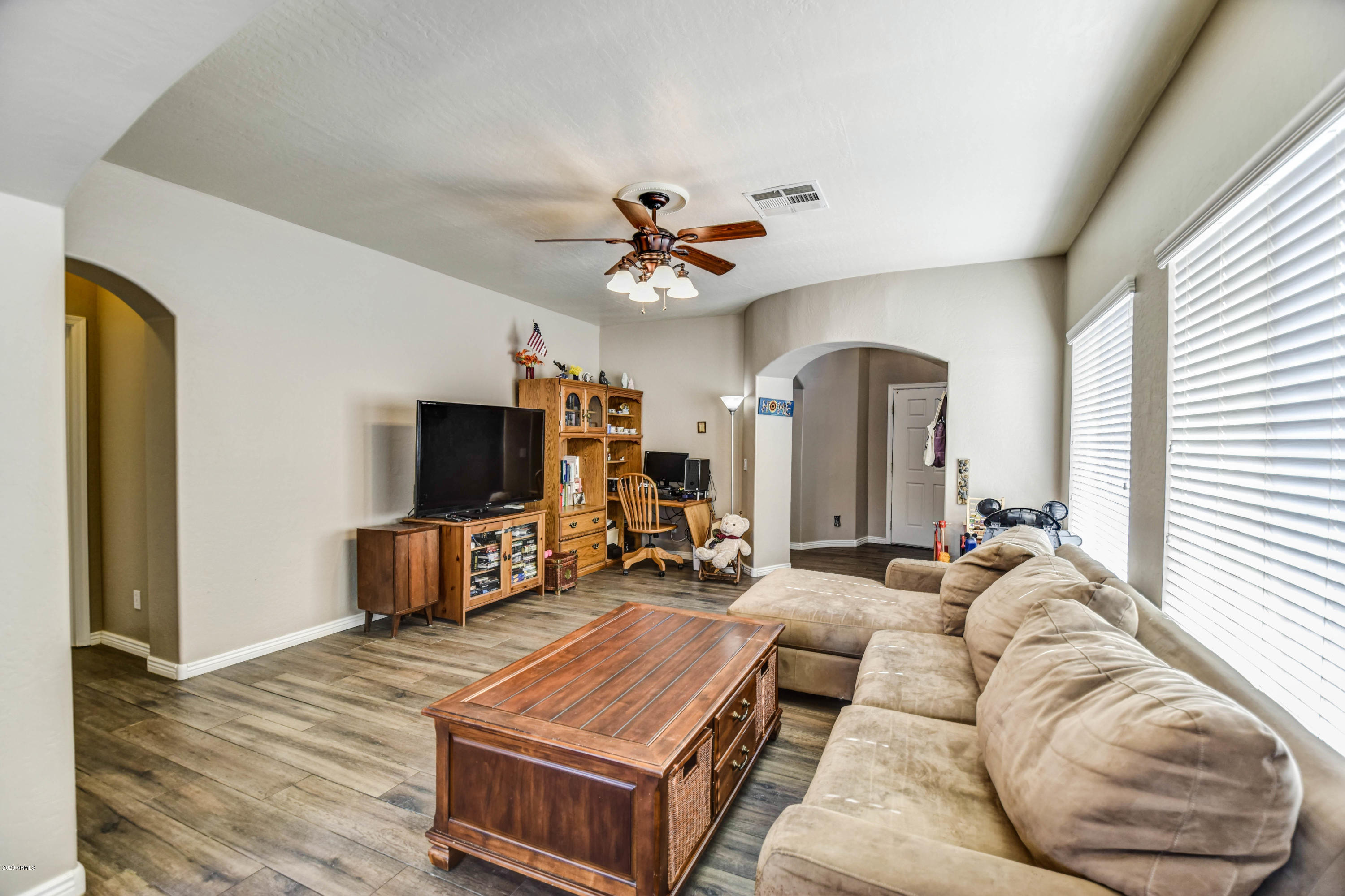 14820 West Wethersfield Road Surprise, AZ 85379 - Photo 12 of 18 living room 1