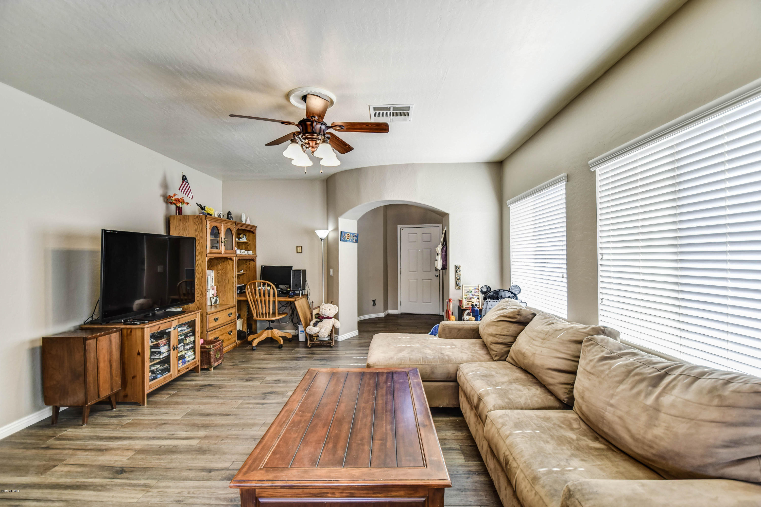 14820 West Wethersfield Road Surprise, AZ 85379 - Photo 13 of 18 living room 2