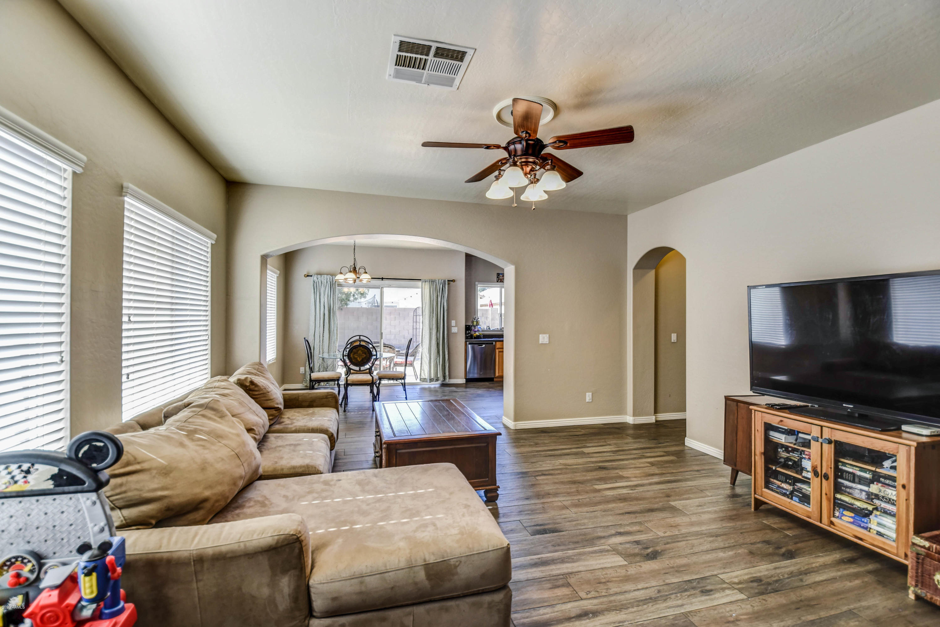 14820 West Wethersfield Road Surprise, AZ 85379 - Photo 2 of 18 living room 4