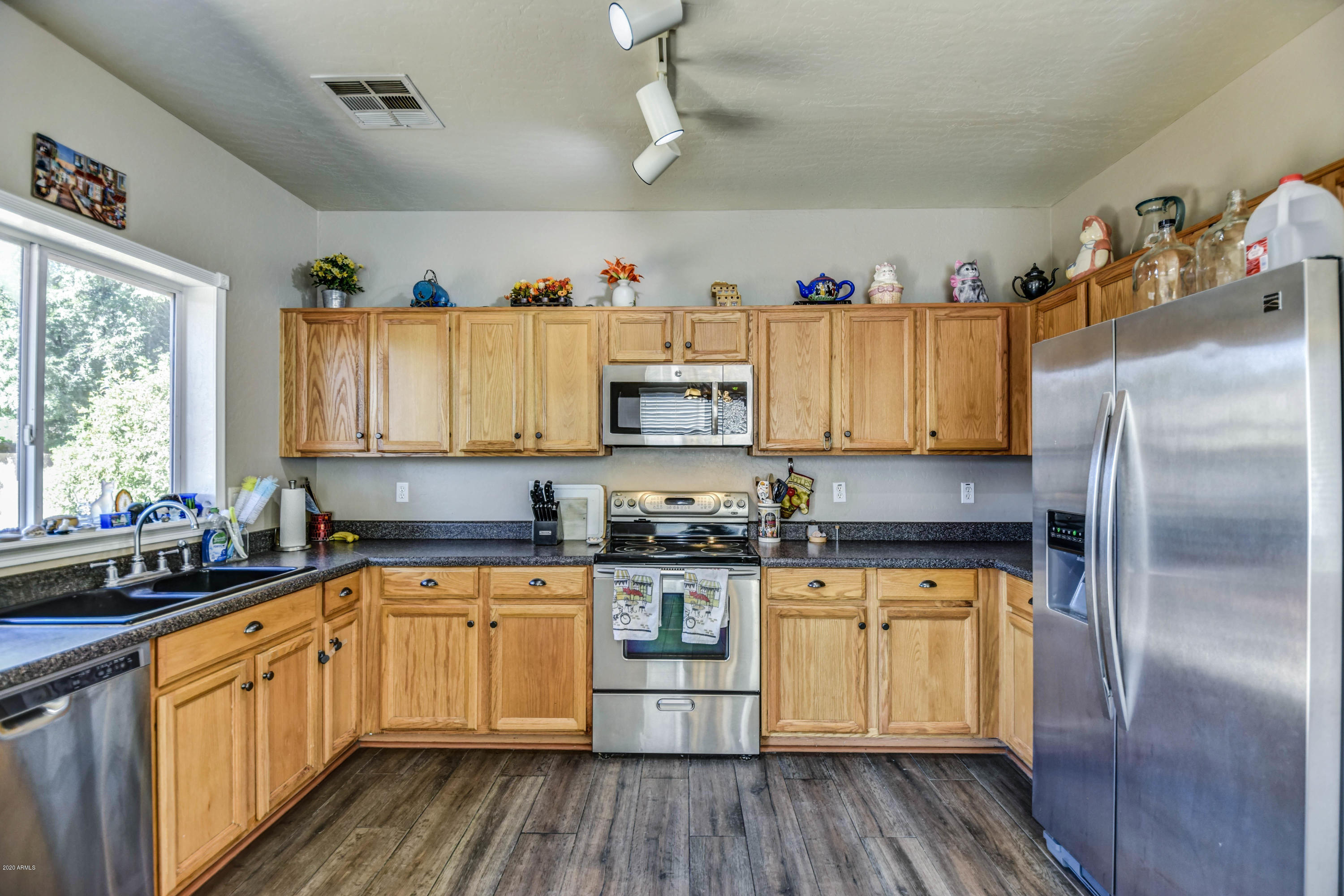 14820 West Wethersfield Road Surprise, AZ 85379 - Photo 3 of 18 kitchen 6