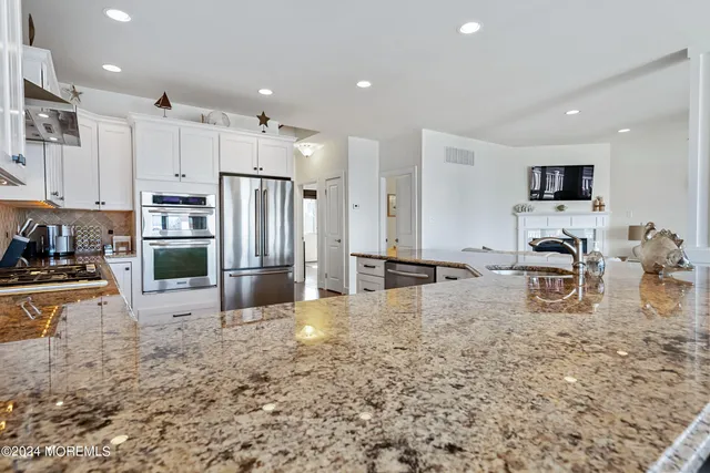 a large kitchen with cabinets
