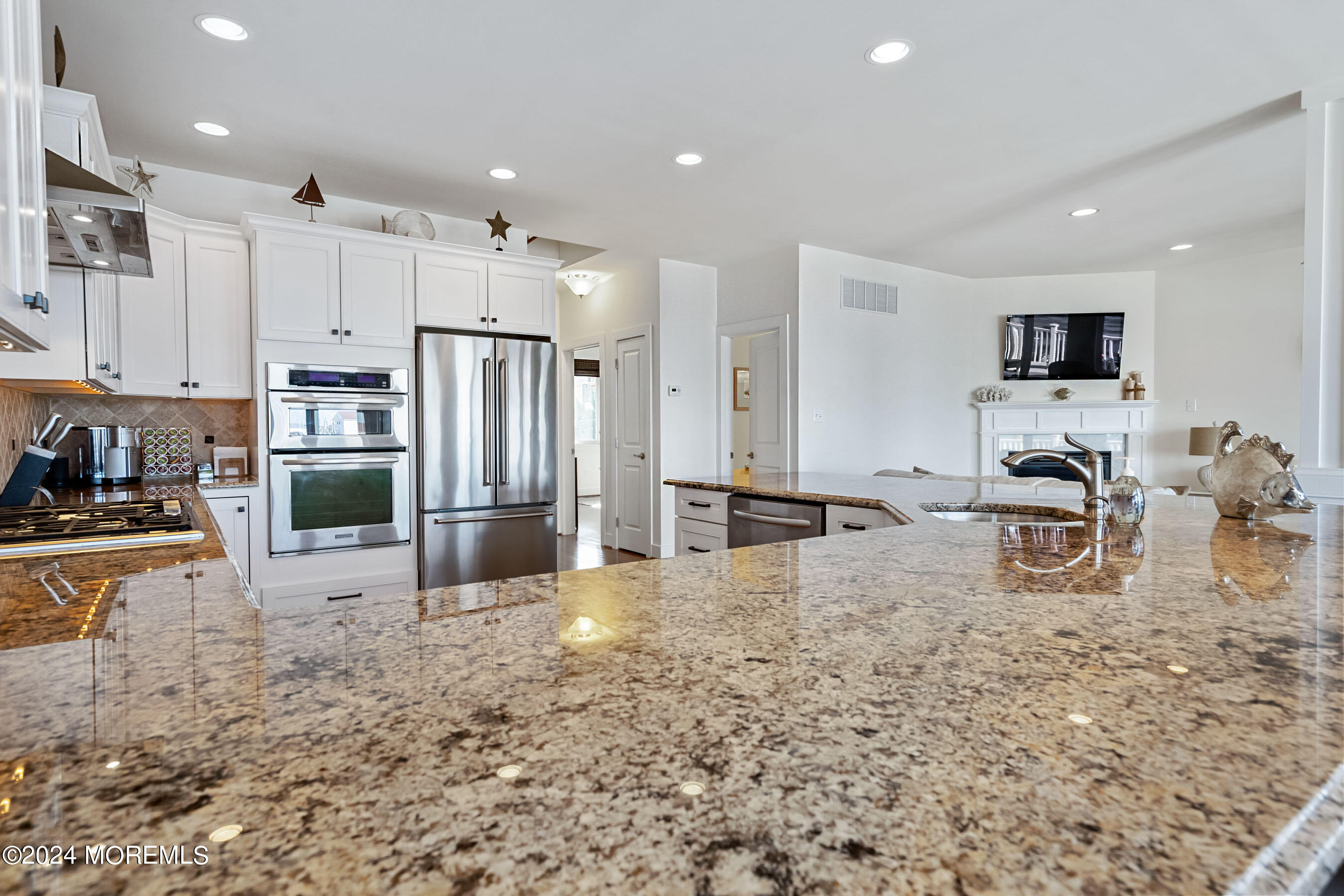556 Riverside Drive Manasquan, NJ 08736 - Photo 22 of 42 a large kitchen with cabinets