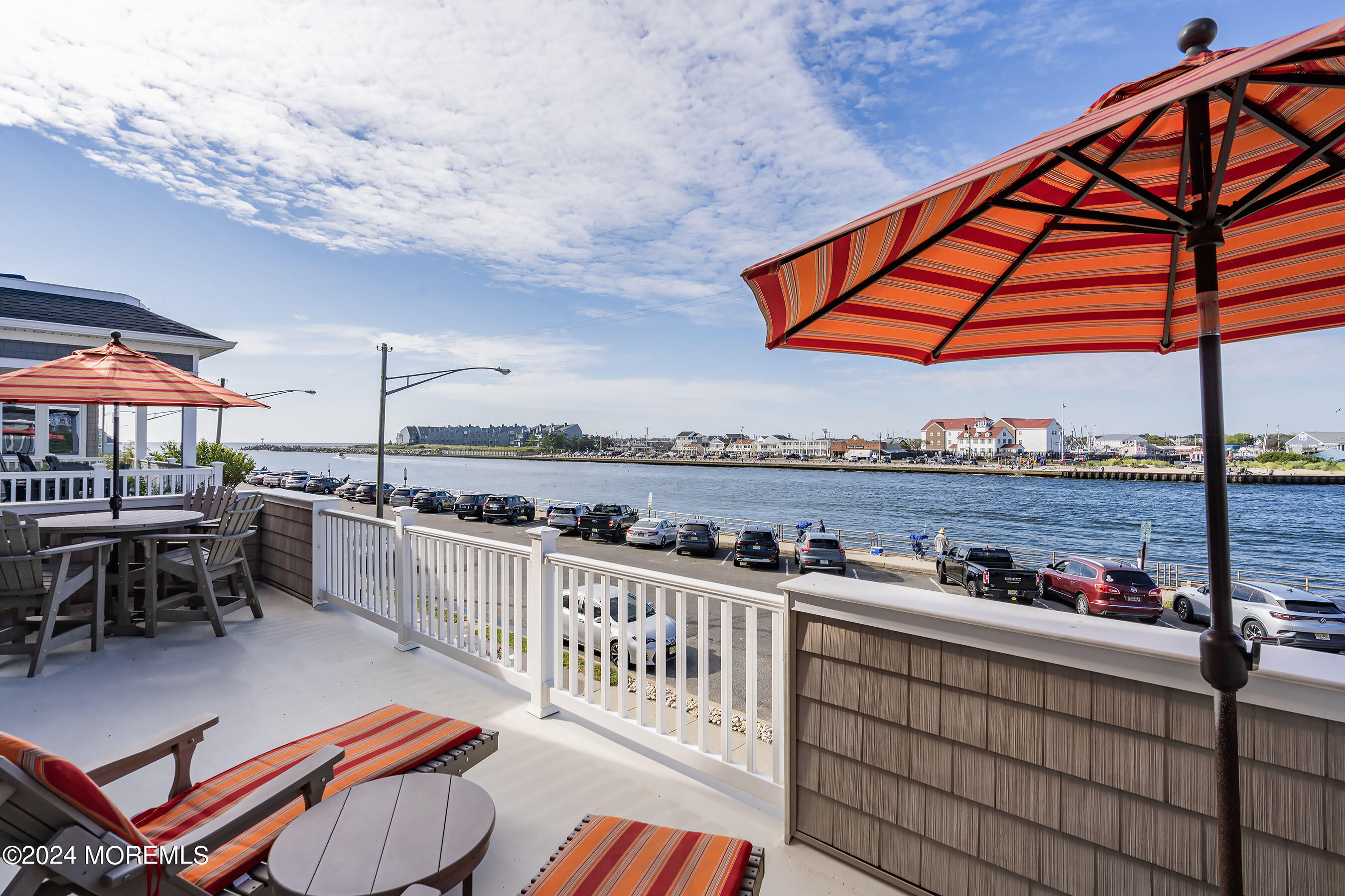 556 Riverside Drive Manasquan, NJ 08736 - Photo 25 of 42 a outdoor space with lots of tables and chairs