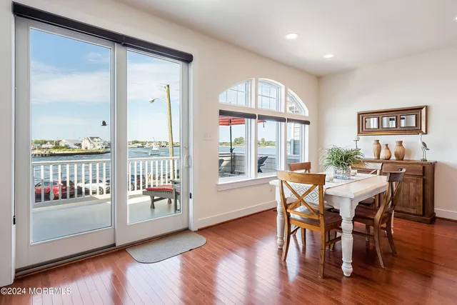 a bedroom with a bed and a table in it