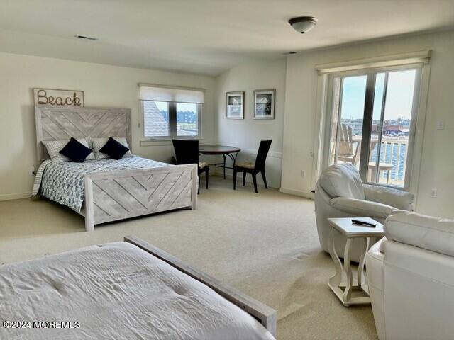 556 Riverside Drive Manasquan, NJ 08736 - Photo 32 of 42 a living room with furniture and a window