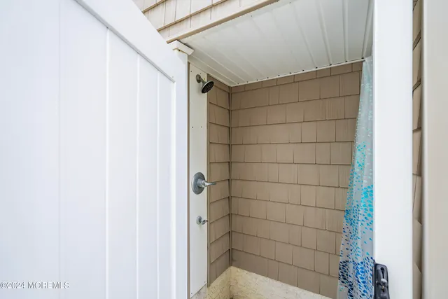 a view of a house with a yard and garage