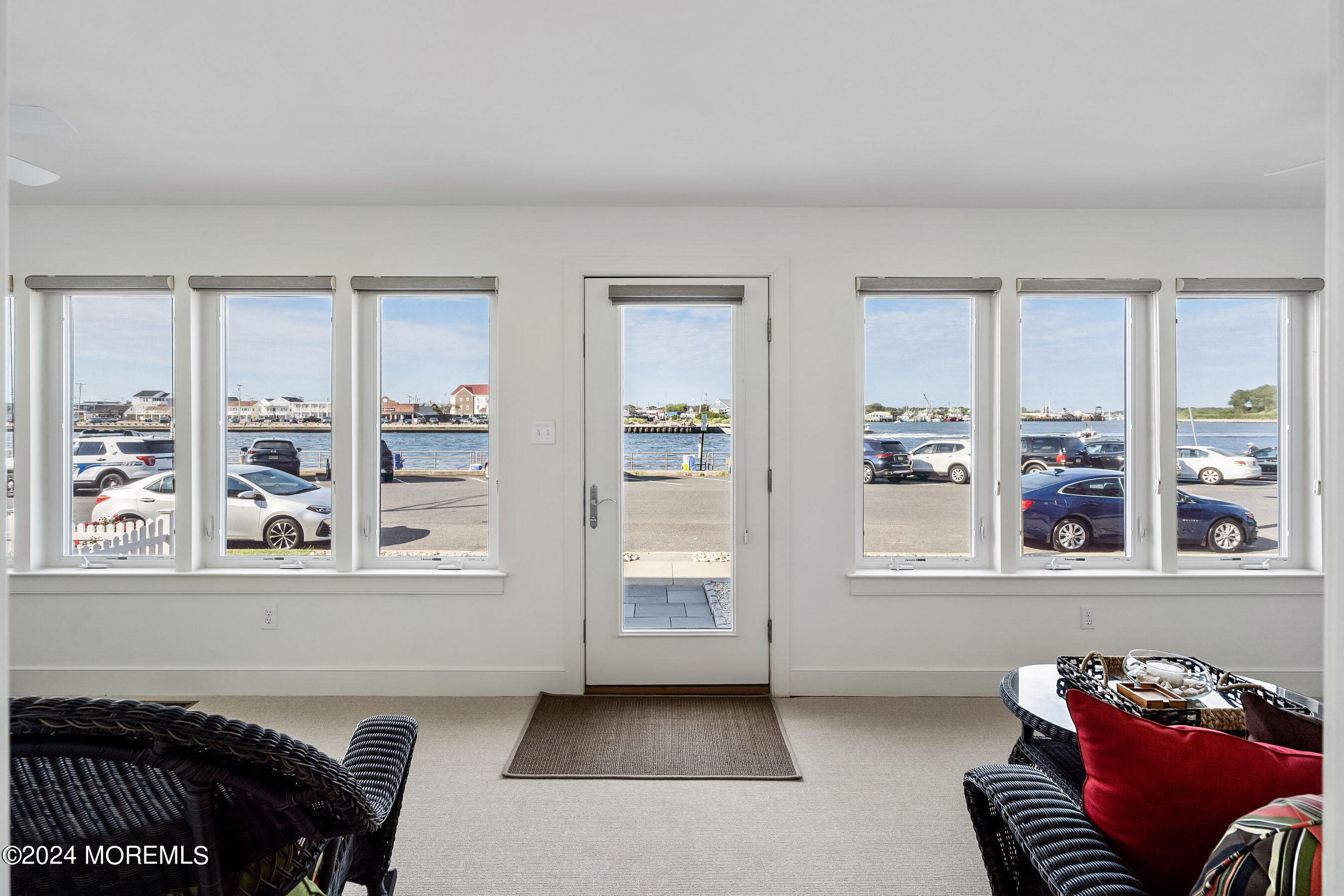 556 Riverside Drive Manasquan, NJ 08736 - Photo 4 of 42 a living room with furniture and windows