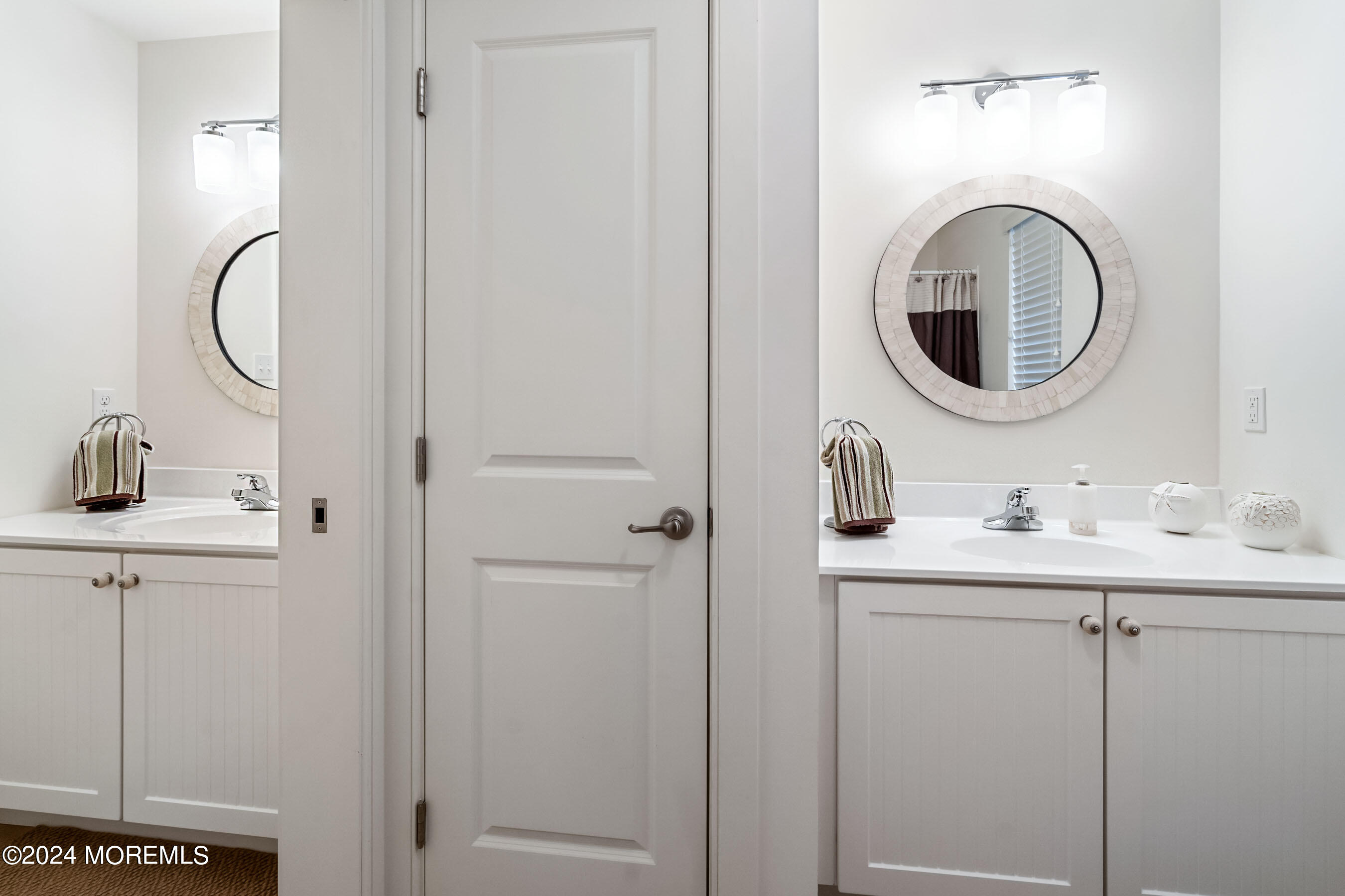 556 Riverside Drive Manasquan, NJ 08736 - Photo 6 of 42 a bathroom with a granite countertop toilet sink and mirror