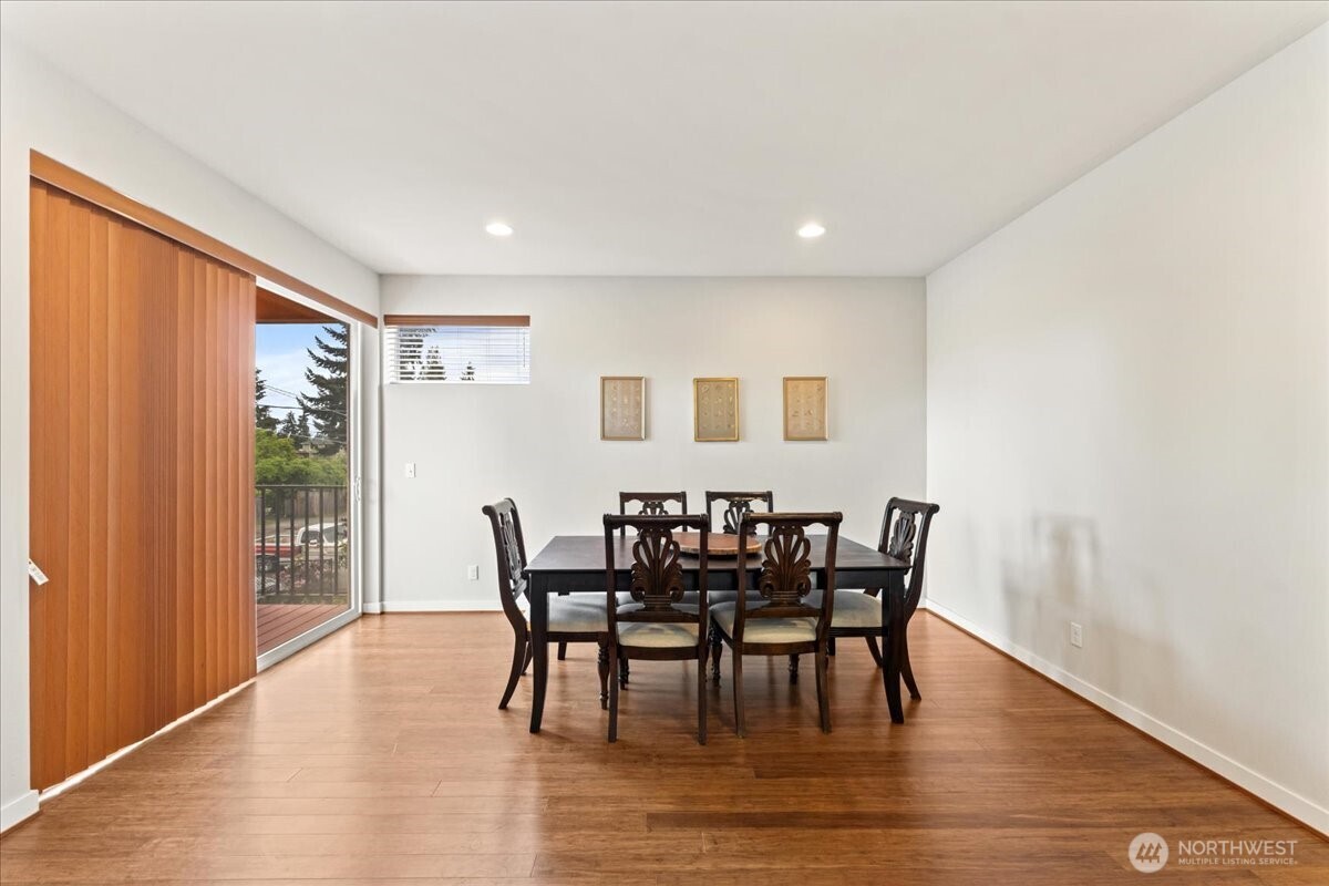 12418 2nd Place Southwest Burien, WA 98146 - Photo 10 of 39 a view of a dining room with furniture and wooden floor