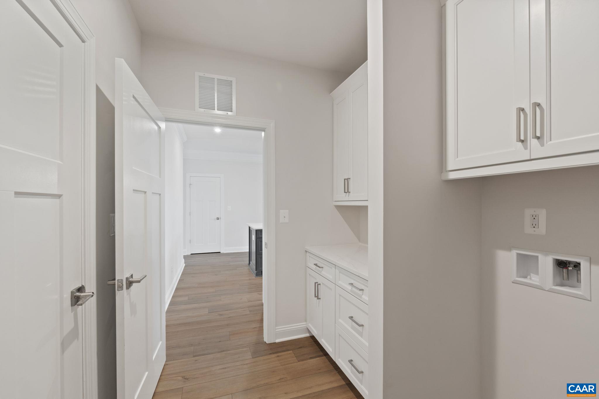 135 Springdale Road Waynesboro, VA 22980 - Photo 23 of 37 a view of hallway with cabinet and mirrors
