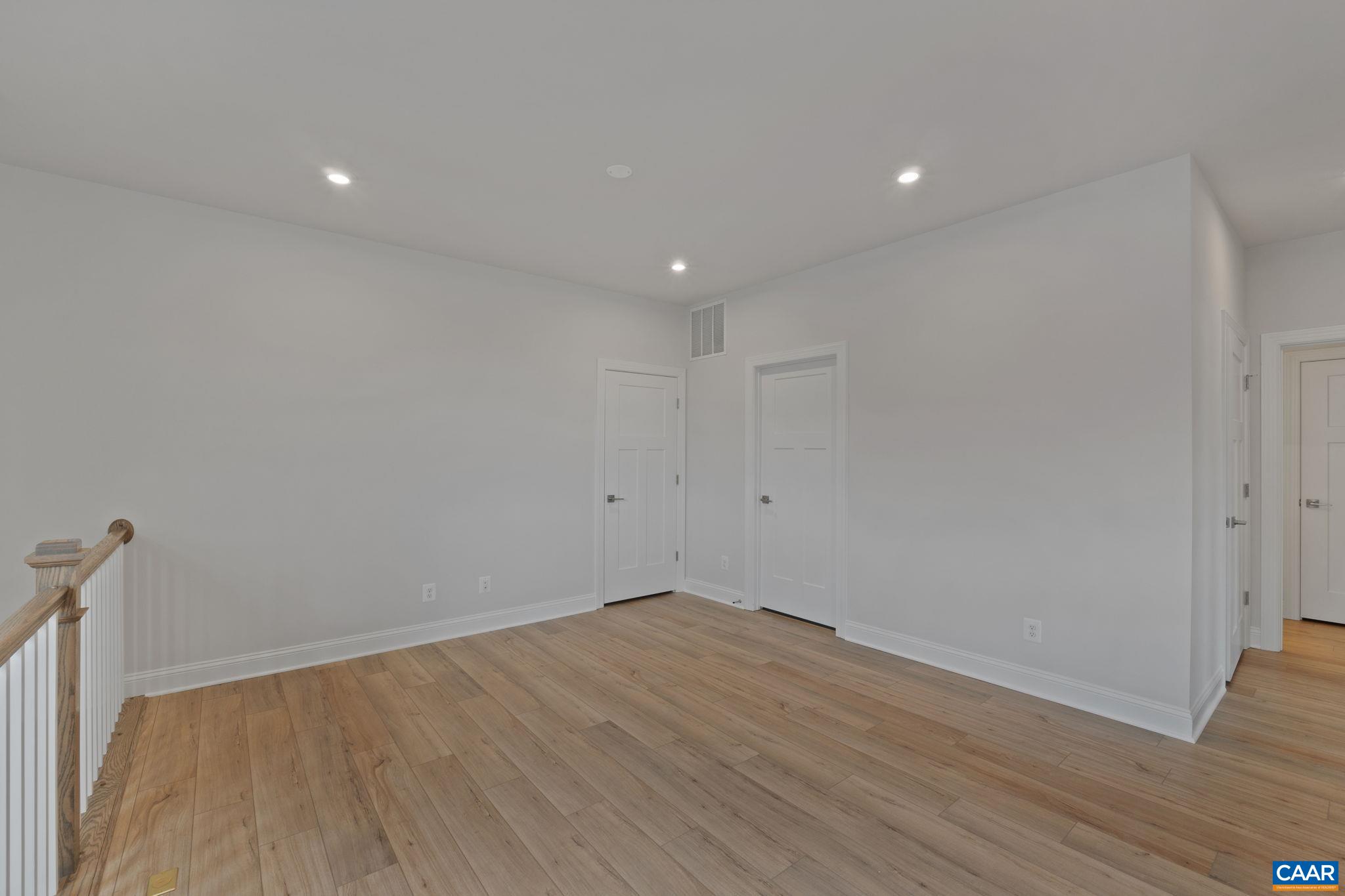 135 Springdale Road Waynesboro, VA 22980 - Photo 26 of 37 a view of empty room with wooden floor