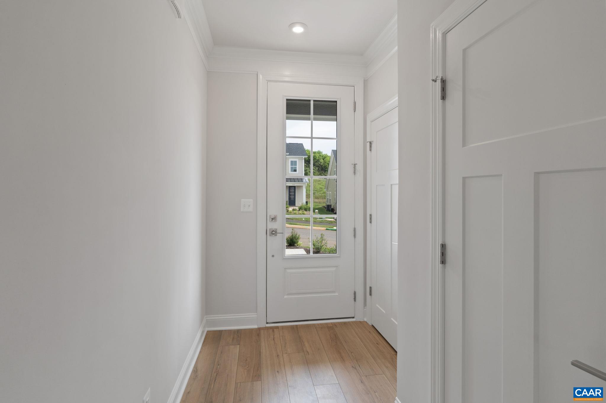 135 Springdale Road Waynesboro, VA 22980 - Photo 5 of 37 a view of a hallway with wooden floor and a small space