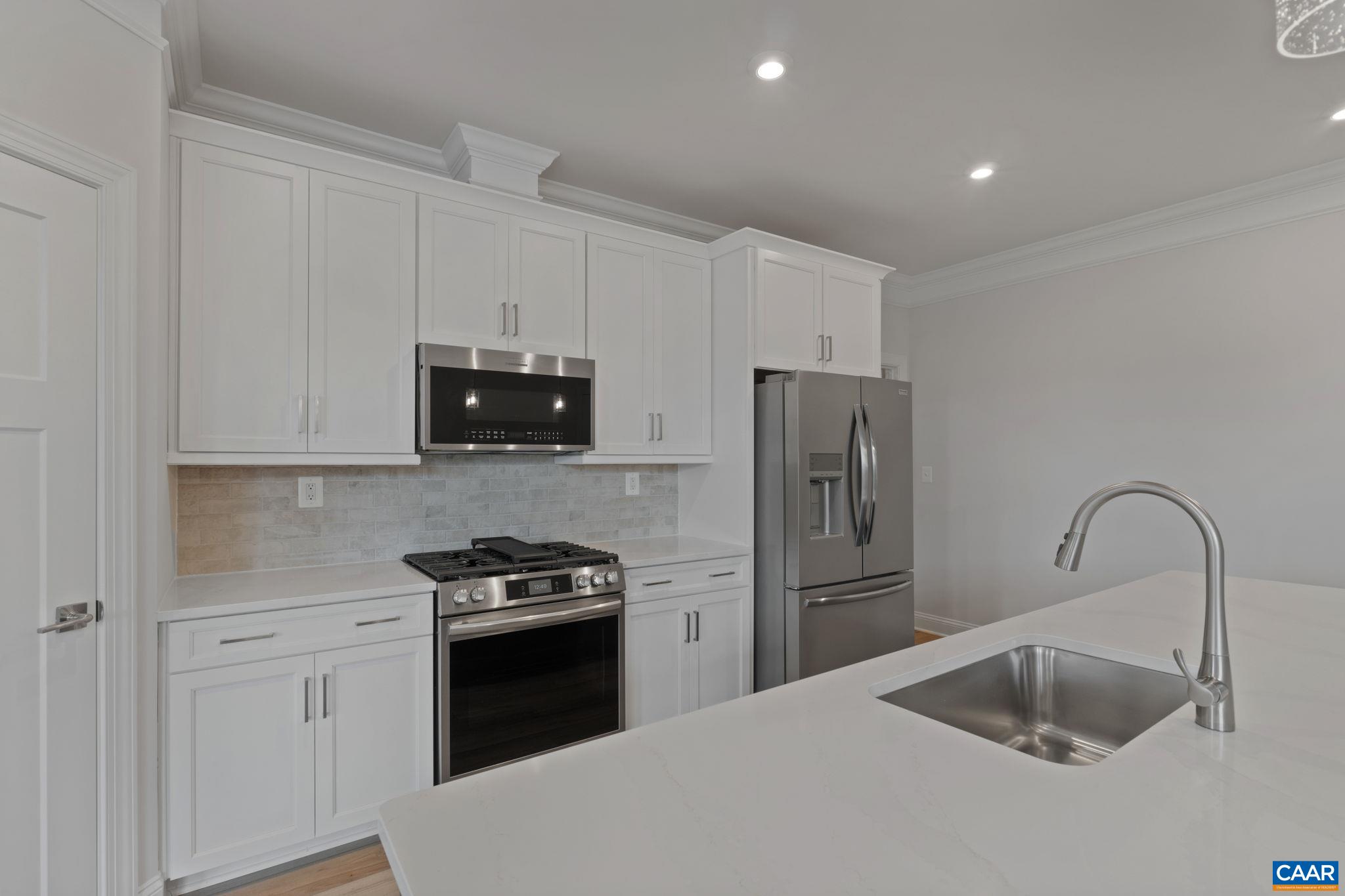 135 Springdale Road Waynesboro, VA 22980 - Photo 10 of 37 a kitchen with a refrigerator sink and microwave