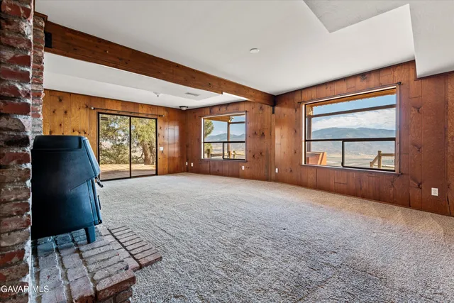 a bathroom with a toilet a sink and a mirror