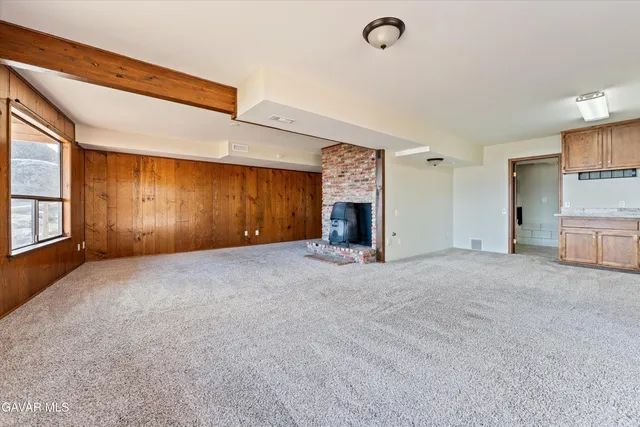 a view of a livingroom with a staircase