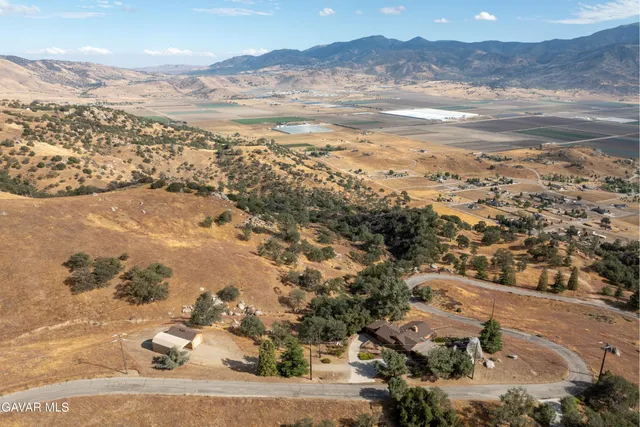a view of a swimming pool with a yard