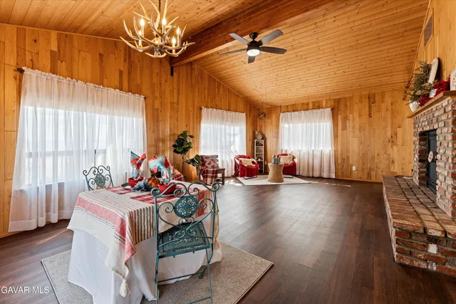 a kitchen with stainless steel appliances granite countertop a stove and a refrigerator