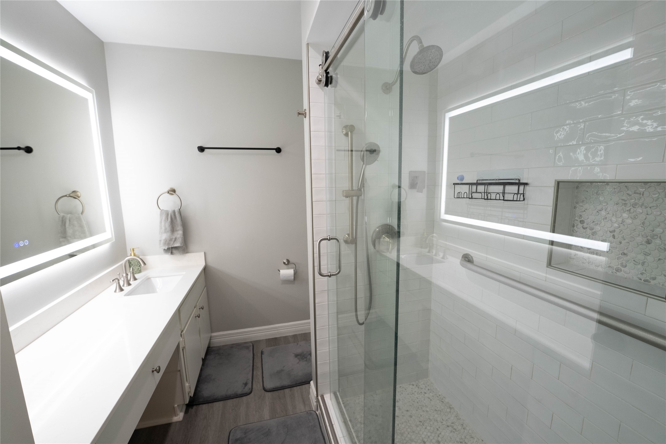 7447 Brompton Street, Unit 7447 Houston, TX 77025 - Photo 20 of 27 Large walk-in shower with vanity in the master bath.