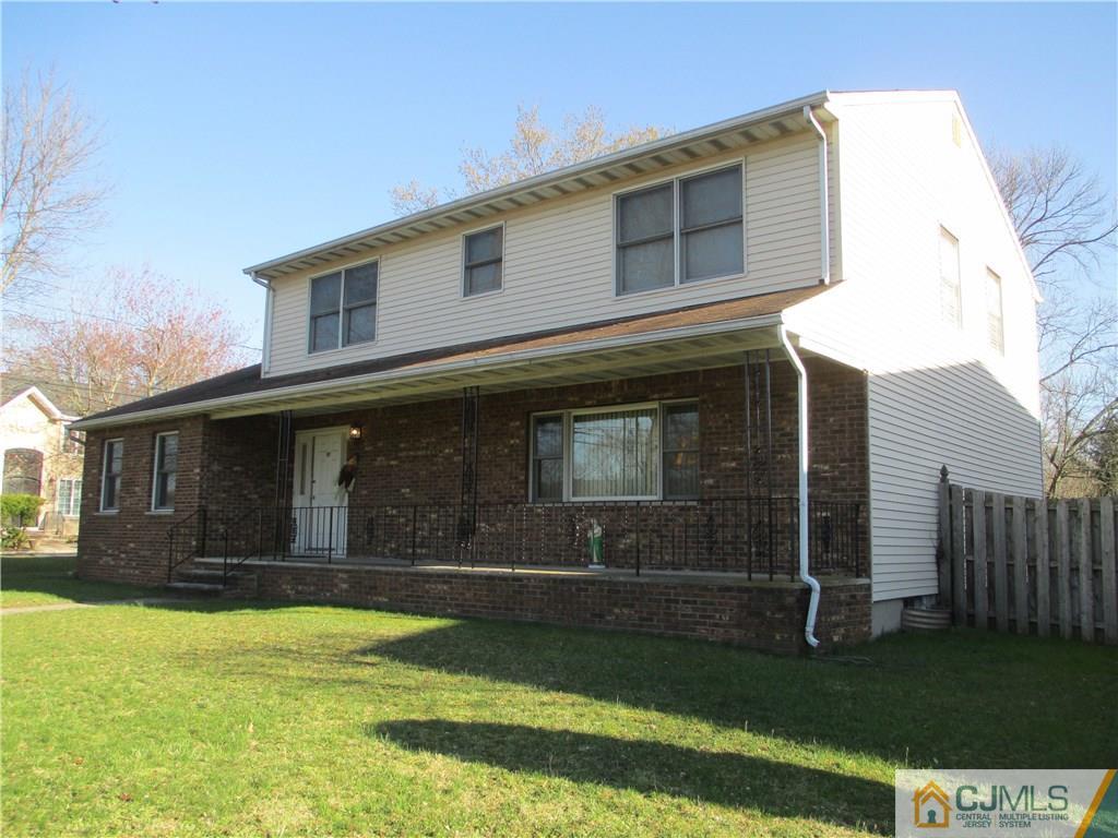 907 New Dover Road Edison, NJ 08820 - Photo 2 of 21 a view of a house with a yard