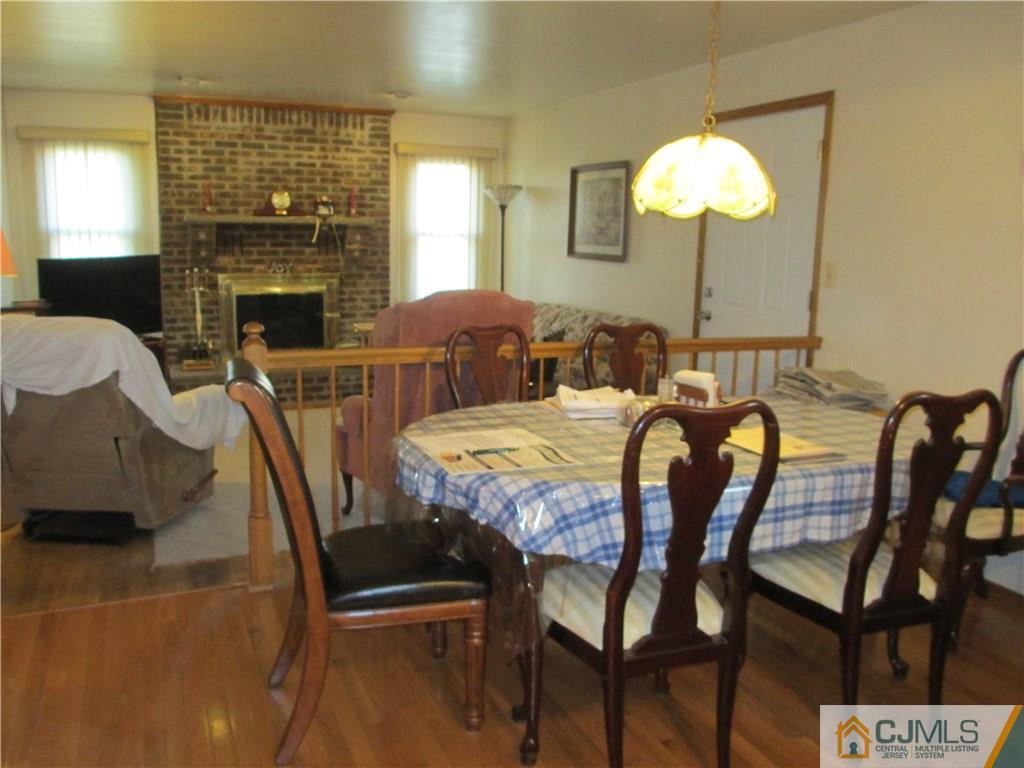 907 New Dover Road Edison, NJ 08820 - Photo 11 of 21 a view of a dining room with furniture