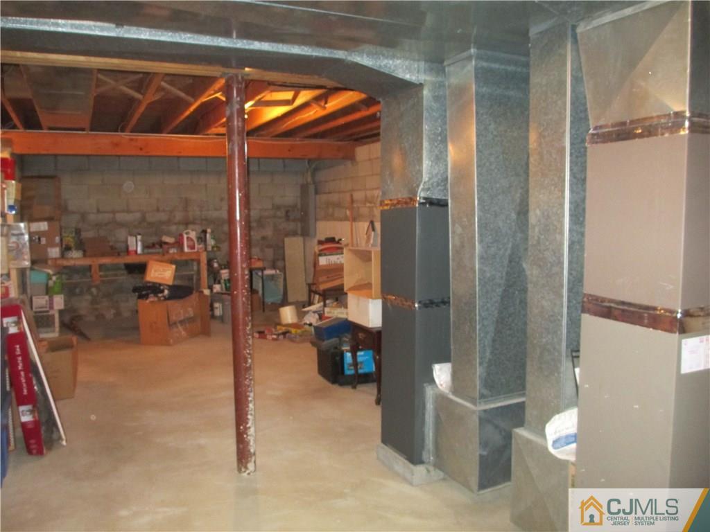 907 New Dover Road Edison, NJ 08820 - Photo 20 of 21 a hallway with a view of living room
